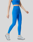 Right side view of FlowLine Core Legging in blue