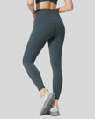 Back angle view of FlowLine Core Legging in dark gray