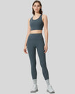Full body front view of FlowLine Core Legging in dark gray
