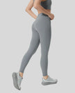 Back angle view of FlowLine Core Legging in gray
