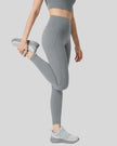 Right side exercise pose wearing FlowLine Core Legging