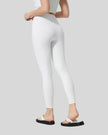 Back angle view of FlowLine Core Legging in white