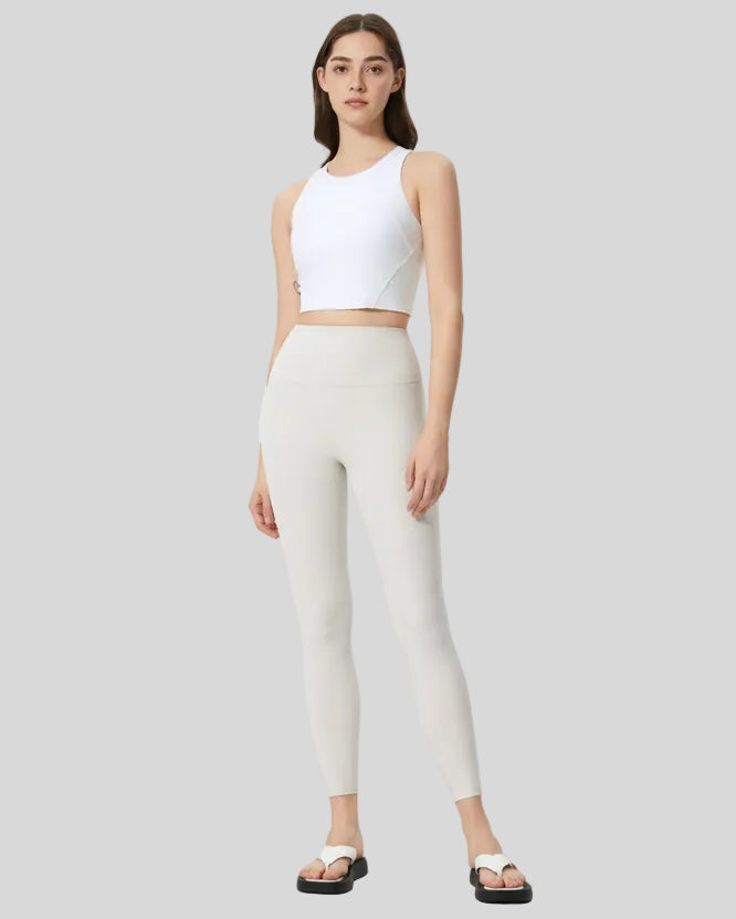 Full body front view of FlowLine Core Legging in white