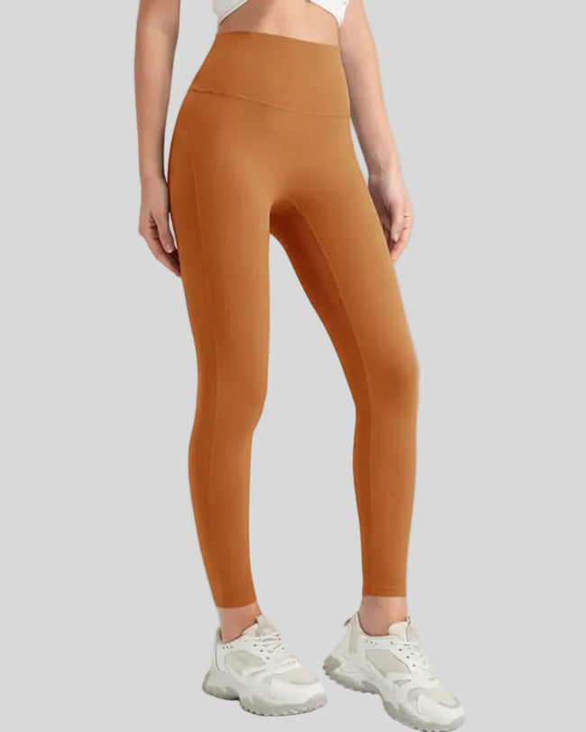 FlowLine Core Legging lightweight version shown from front angle in caramel