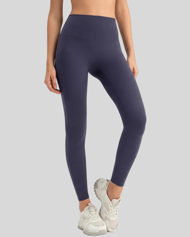 Lightweight FlowLine Core Legging in indigo, front view