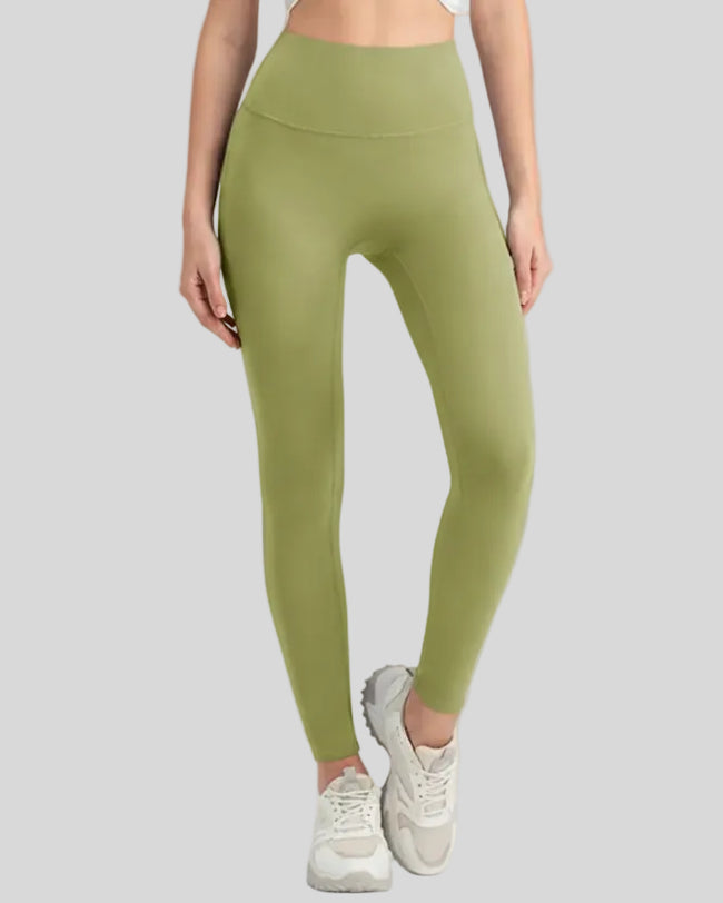Lightweight FlowLine Core Legging in olive, front view