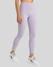 Angled front view of Athlesi FlowLine Core legging in pink purple