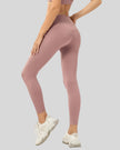 Back angle view of dusty pink FlowLine Core Legging with smooth seamless design
