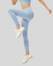 Side view of smooth FlowLine Core Legging with high-waist fit in light blue