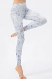 Side view of smooth FlowLine Core Legging with high-waist fit in white