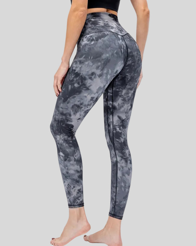 Back angle view of gray FlowLine Hold Legging showing sculpted fit