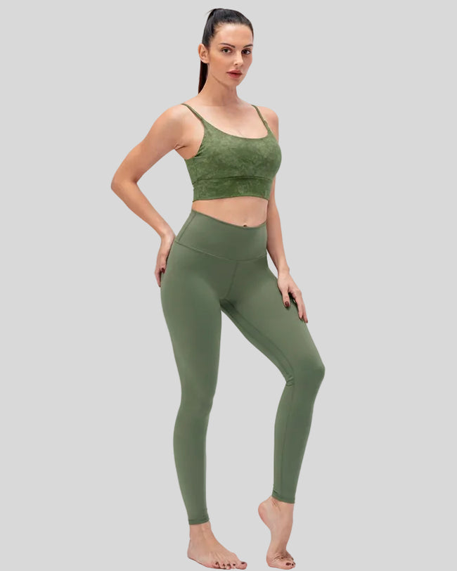 Full body front view of FlowLine Hold Legging in matcha green