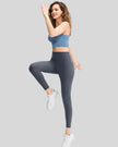 Full body front angle view of FlowLine Hold Legging in dark gray with slim fit silhouette
