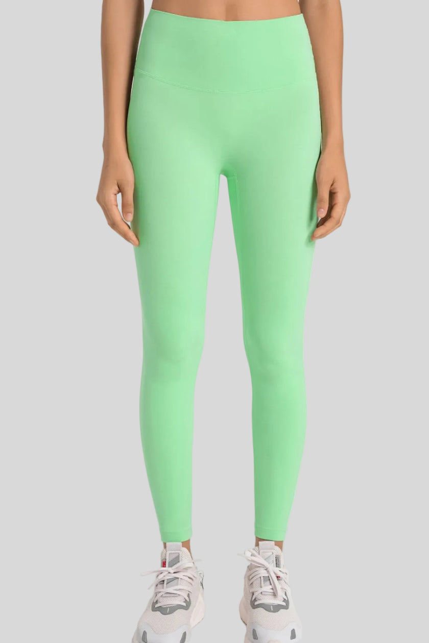 High-rise waistband of FlowLine Hold Legging in Gum Leaf - Athlesi