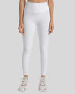 High-rise waistband of FlowLine Hold Legging in White - Athlesi