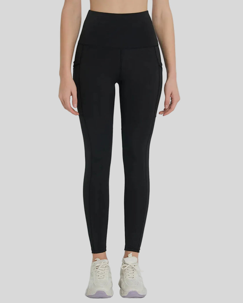 Front view of Athlesi FlowLine Hold Pocket Legging in black with a clean, high-waist silhouette