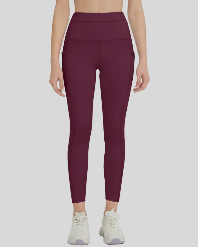 Front view of Athlesi FlowLine Hold Pocket Legging in burgundy with a clean, high-waist silhouette
