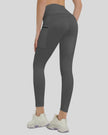 Back view showing a streamlined fit and refined construction of the FlowLine Hold Pocket Legging in dark gray