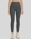 Front view of Athlesi FlowLine Hold Pocket Legging in dark gray with a clean, high-waist silhouette