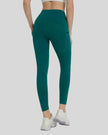 Back view showing a streamlined fit and refined construction of the FlowLine Hold Pocket Legging in dark green