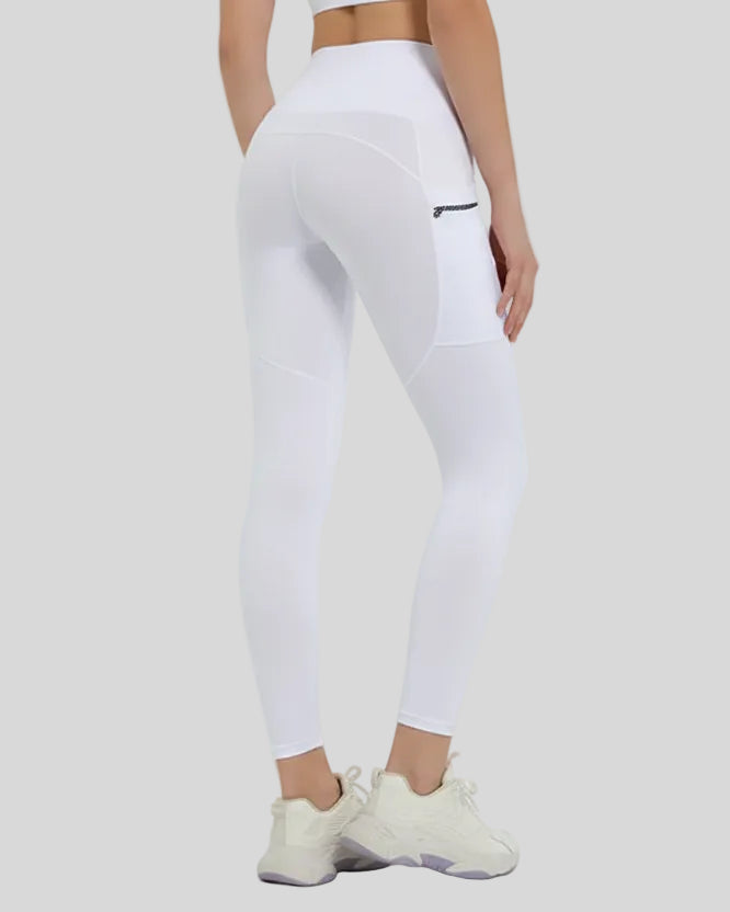 Back view showing a streamlined fit and refined construction of the FlowLine Hold Pocket Legging in white