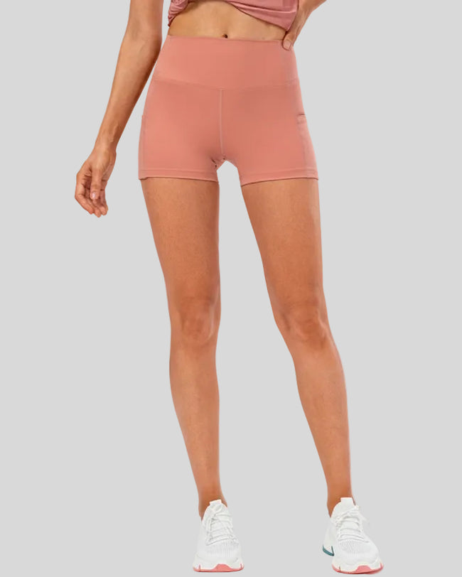 Athlesi FlowLine Hold pocket short in coral, front view