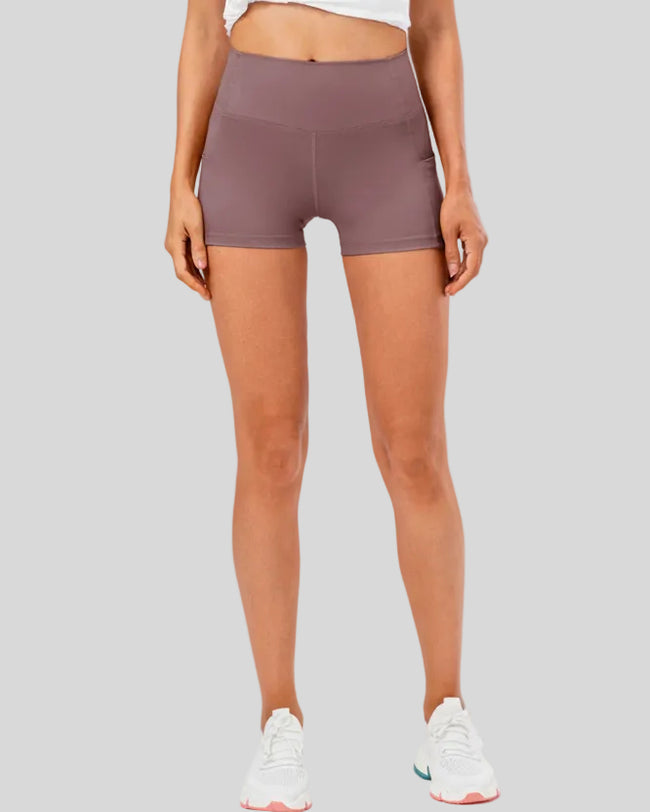 Athlesi FlowLine Hold pocket short in moonlit mauve, front view