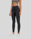 Front angle view of FlowLine Hold Soft Legging in black with fluid silhouette