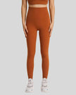 Front view of FlowLine Hold Soft Legging in brown with smooth high-waist fit