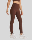 Side view of FlowLine Hold Soft Legging in coffee showing streamlined fit