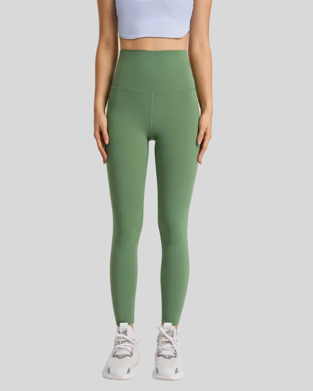 Full front view of FlowLine Hold Soft Legging in green with smooth high-waist fit