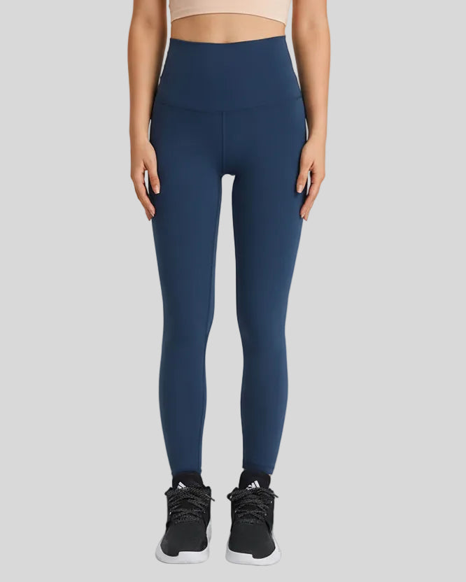 Front view of FlowLine Hold Soft Legging in navy with smooth high-waist fit