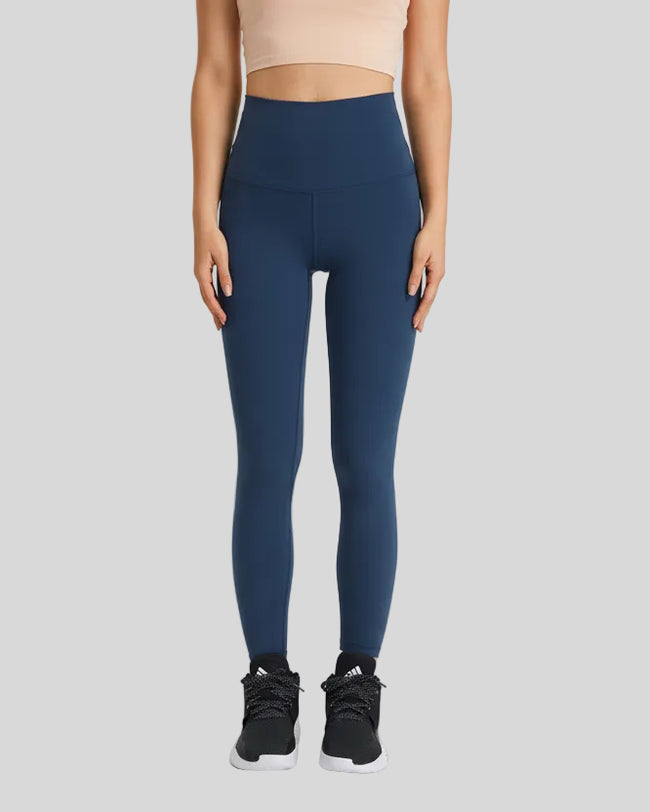 Full front view of FlowLine Hold Soft Legging in navy with smooth high-waist fit