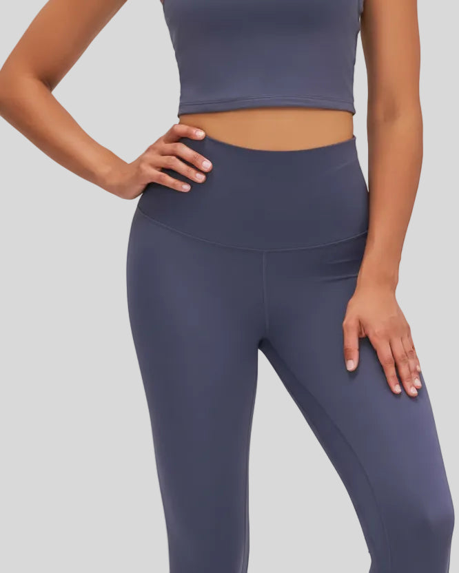 Closeup of elastic waistband and hip area on FlowLine Hold Soft Legging in steel