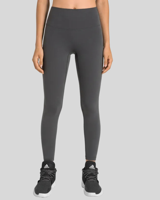 High-rise waistband of FlowLine Hold Legging in Dark Gray - Athlesi