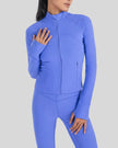 Angled front view of Athlesi FlowMotion Performance jacket in cobalt blue