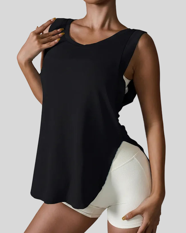 Angled front view of black FlowSplit Active Tank showing soft fabric and clean lines