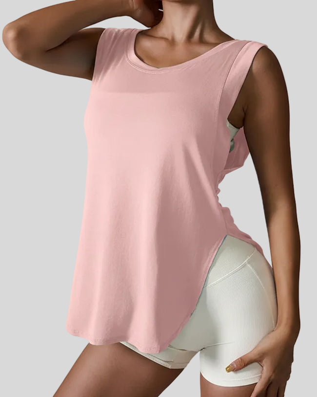 Angled front view of blush pink FlowSplit Active Tank showing soft fabric and clean lines