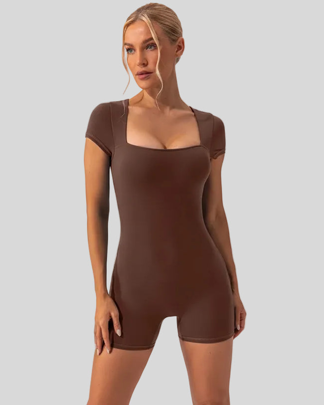 Angled front view of the FormAlign Square-Neck Romper showing sculpting fit in brown