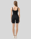 Full body back view of FormEase Sculpt Romper in black