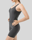 Left side view of FormEase Sculpt Romper in dark gray