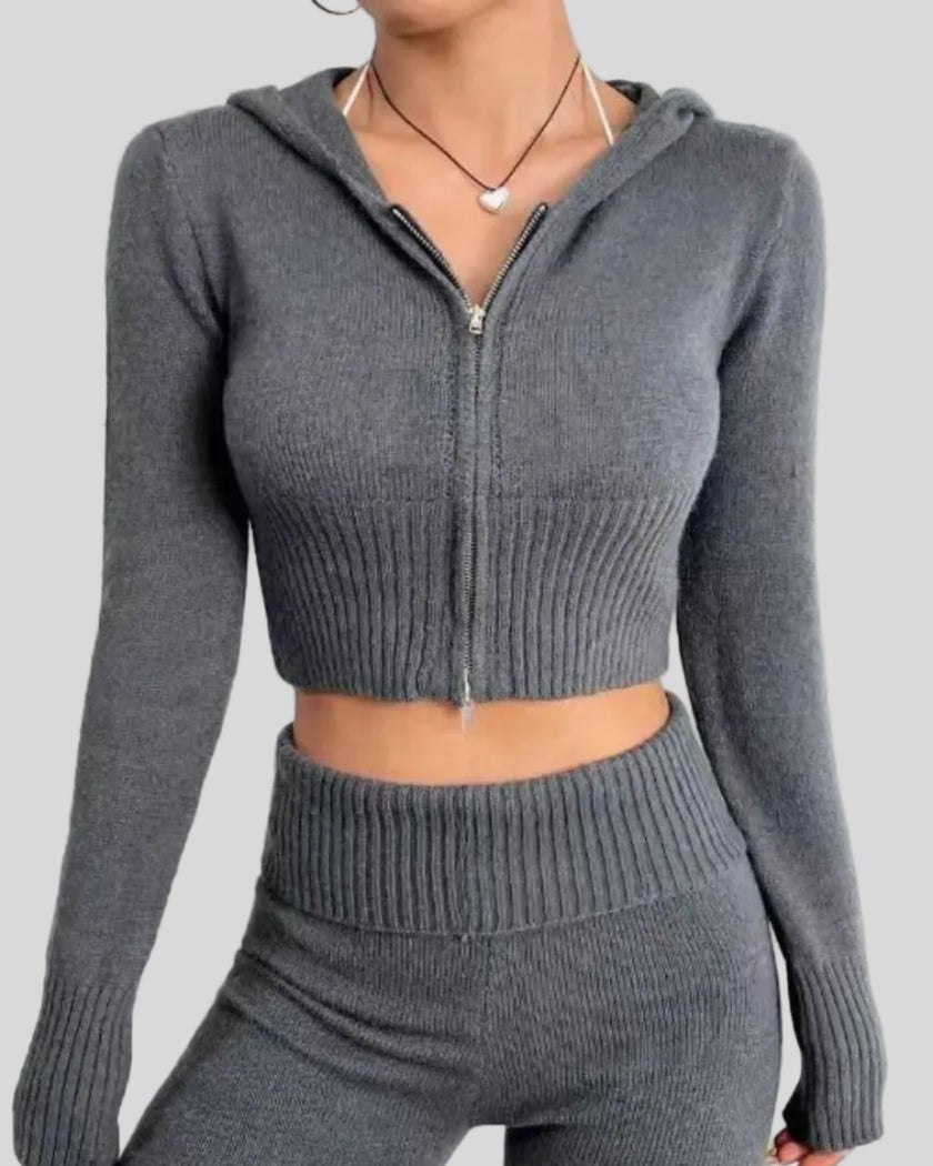 Front upper body view of dark gray Athlesi FormFlare zip hoodie set showing fitted waist and zip detail