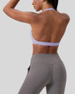 FormLine halter sports bra angled back view showing halter silhouette