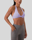 FormLine halter sports bra angled front view highlighting pleated detail