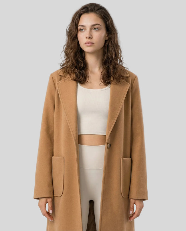 FormLine Trench in khaki worn by model mid body front view highlighting fit and structure