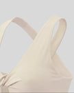 Angled view highlighting the twist-front design of the FormLine Twist Sports Bra