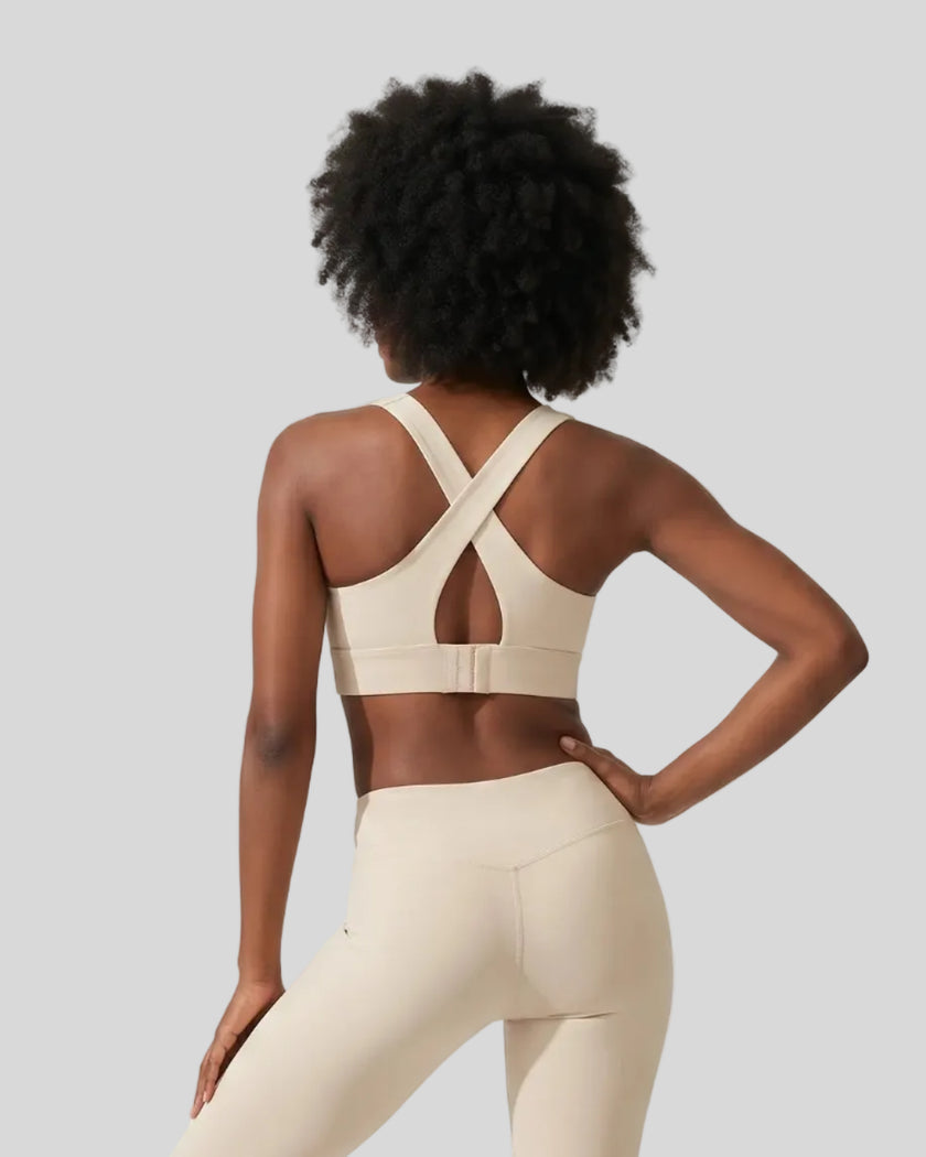 Back view of the FormLine Twist Sports Bra in khaki, highlighting the cross-back design