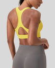 FormLine wrap sports bra in yellow, angled back view showing smooth support fit