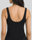 Back closeup view of FormMove Active Dress in black with clean sleeveless design