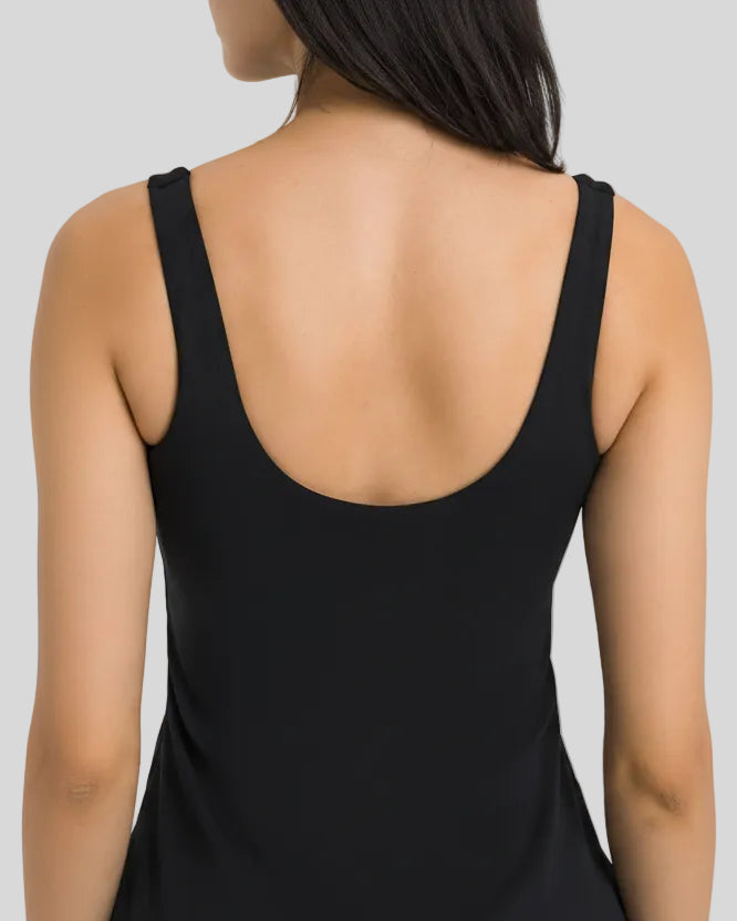 Back closeup view of FormMove Active Dress in black with clean sleeveless design
